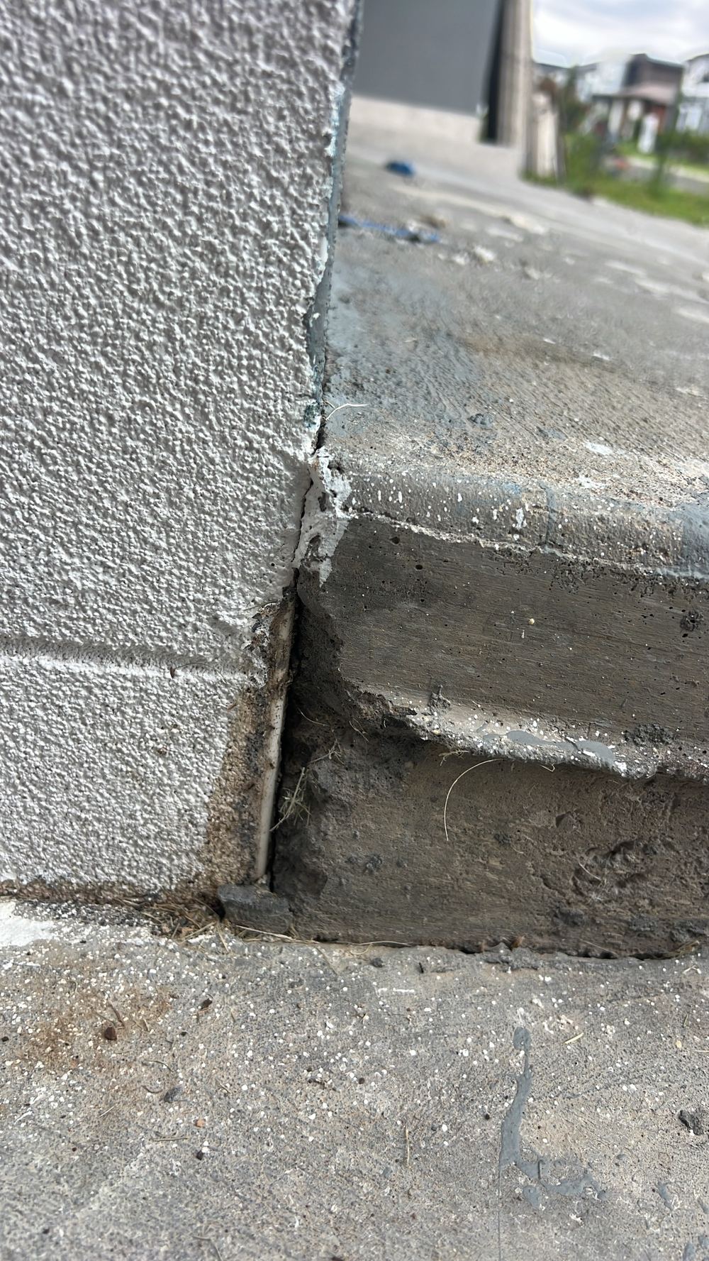 No isolation joint between the house slab and the new driveway, found during a handover inspection in Tallawong