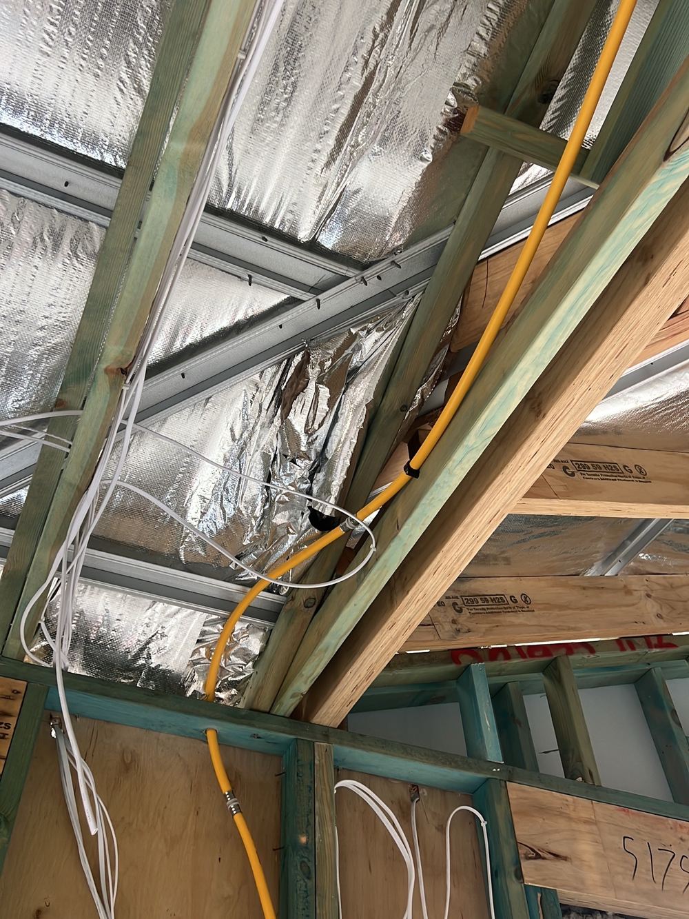 Tears in the roof sarking that need taping before lining goes up, found during a lock-up inspection in Kellyville