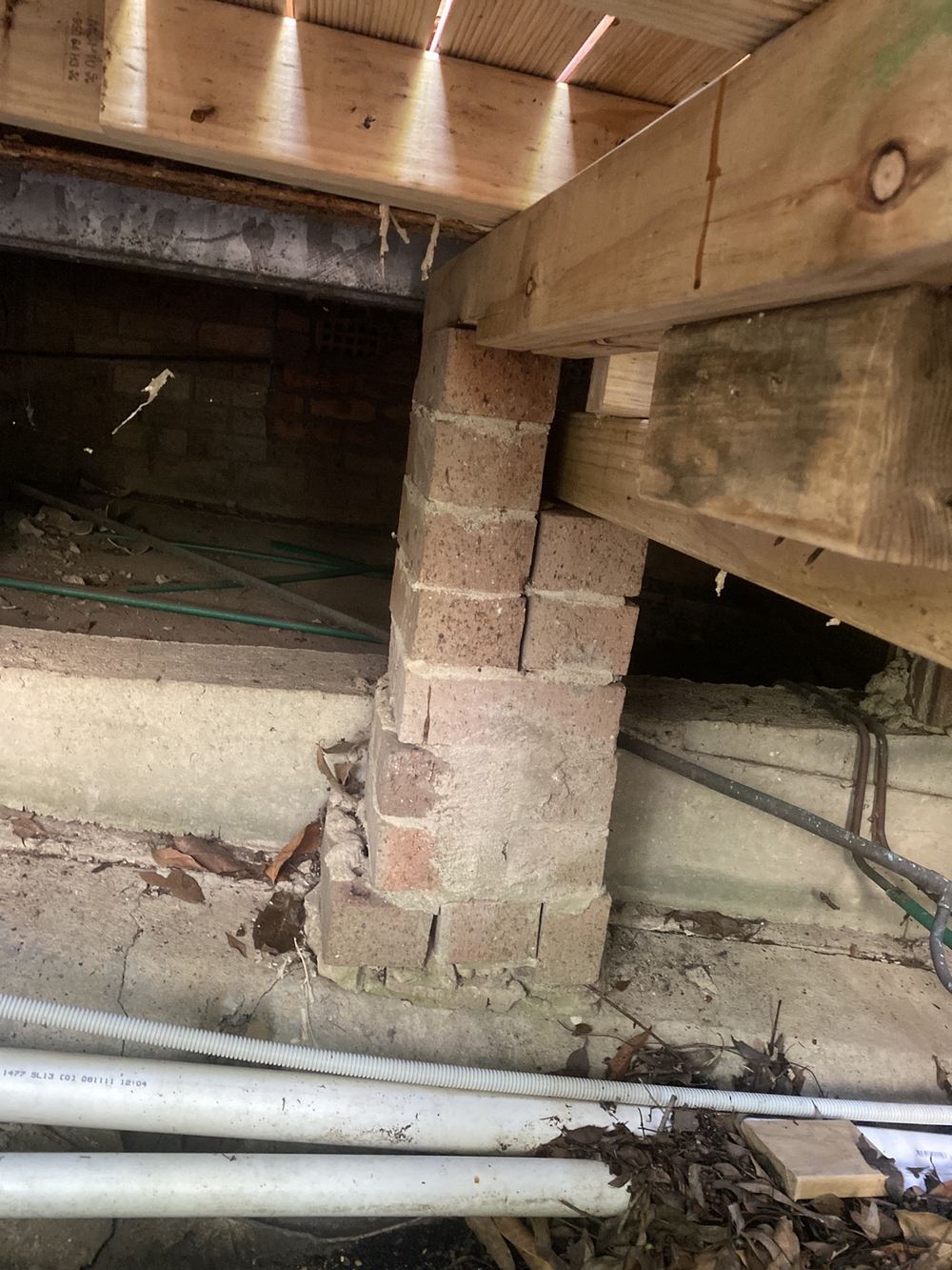 Support column shifted out of line beneath its beam, found during a pre-purchase inspection in St Ives