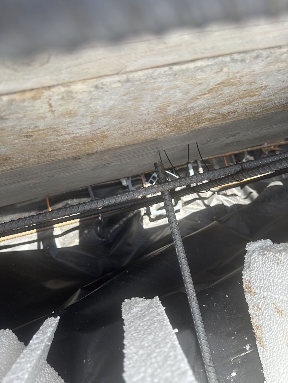 Beam bar ends at slab stage, waiting on the engineer to confirm a down bend, found during a slab inspection in Tallawong